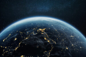 Earth at night from space showing city lights, the kind of satellite imagery a geospatial analyst studies